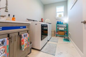 Laundry room with modern appliances